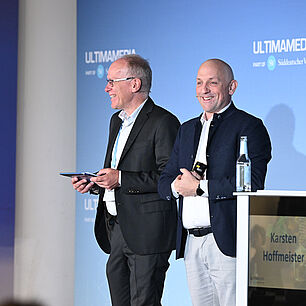 Karsten Hoffmeister and Martin Schleicher on the stage of Automotive Software Strategies Conference