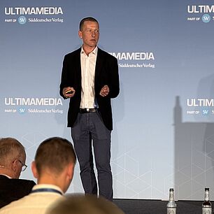 Augustin Friedel on stage of Automotive Software Strategies
